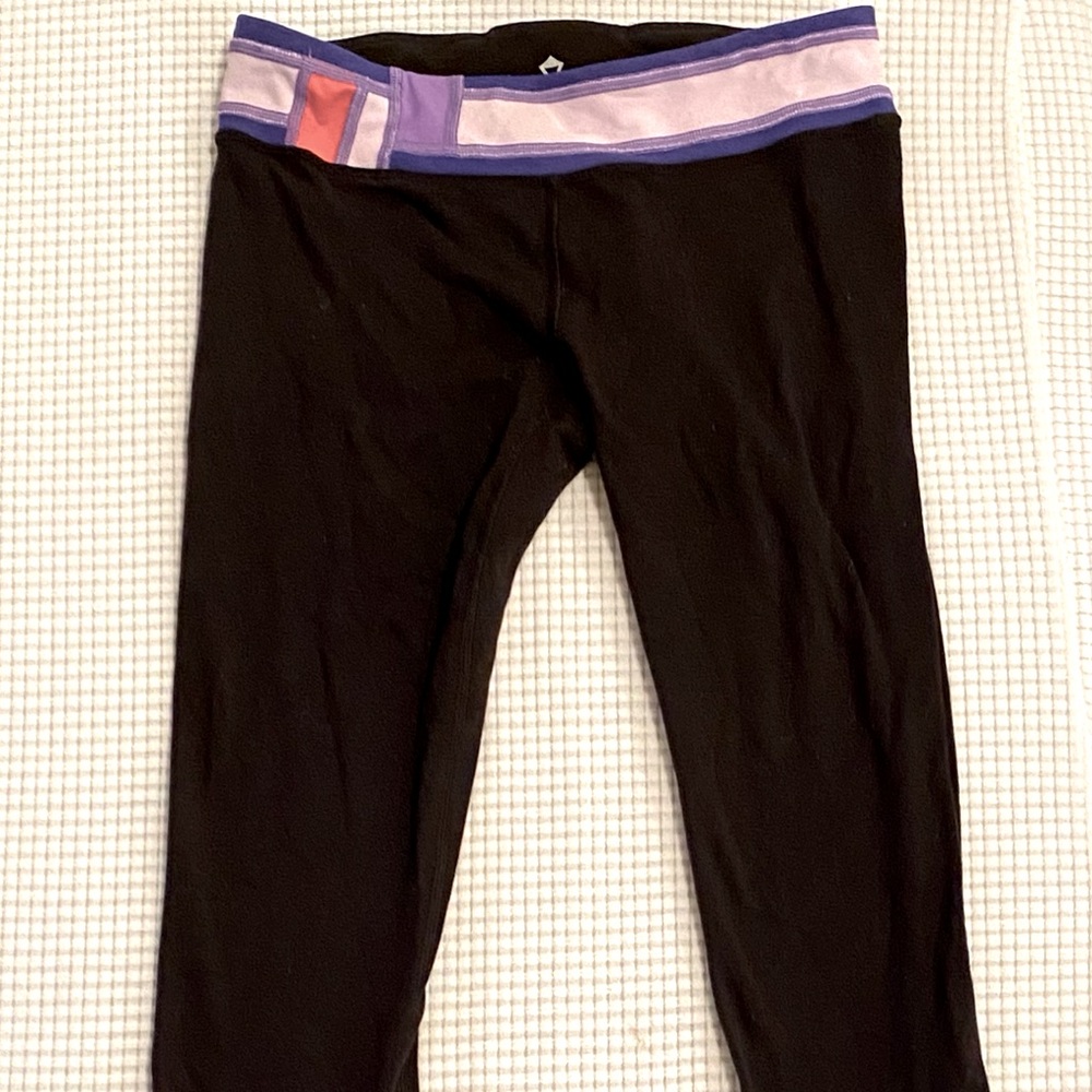 Black Ivviva leggings with Purple band
